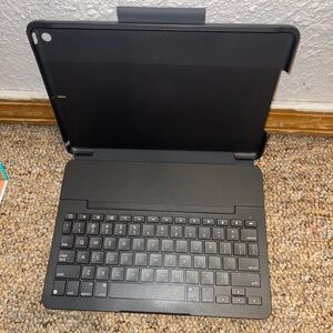 Logitech Slim Folio iPad‎ (7th and 8th Gen) 2020 with Bluetooth keyboard.